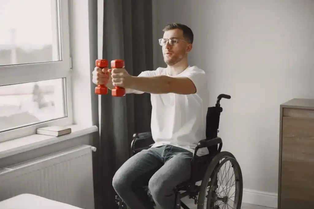 Image of man doing exercise in his wheelchair to aid weight loss Essex