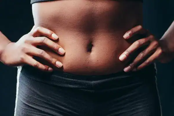 Toning Your Stomach: The Ultimate Guide to Achieving a Sculpted Stomach While Shedding Pounds 1 Image of a toned stomach after non surgical treatment Essex